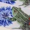 Detail of Garden Collage Bookmark showing a green garden frog flanked by a red poppy and blue cornflower
