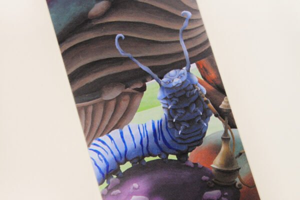 Detail of Wonderland Caterpillar Bookmark showing the anthropomorphic caterpillar on a purple toadstool with a water pipe.