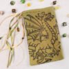 Gold Spray Heraldic Dragon Pouch with polyhedron dice, good as dice bag and also as tarot card bag, runes bag or spell bag